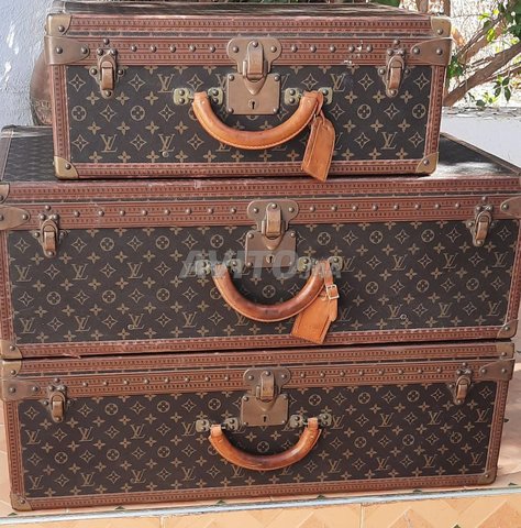 3 valises Louis Vuitton 