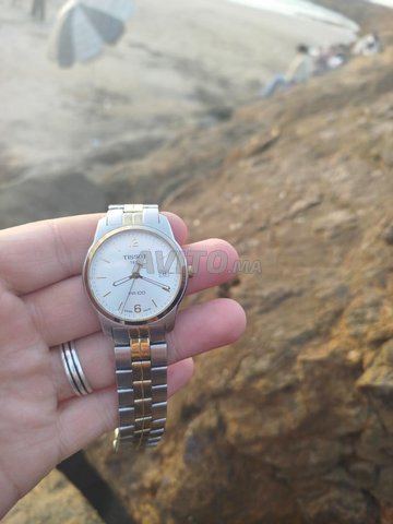 montre Tissot  r100 swiss original 
