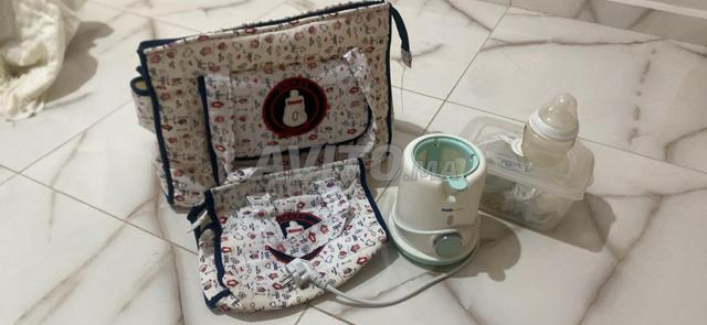 tir lait chauffe bibron et  deux sac