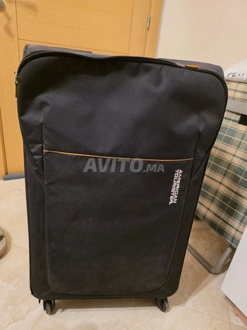 Valise American Tourister taille L, 4 roues 360°