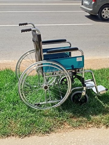 fauteuil roulant quasi neuf en inox