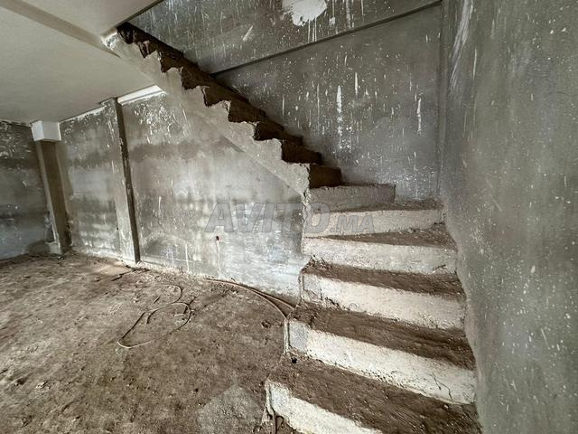 magasin a vendre en face clinique er raz