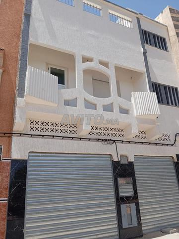 Maison avec magasin commercial à vendre 