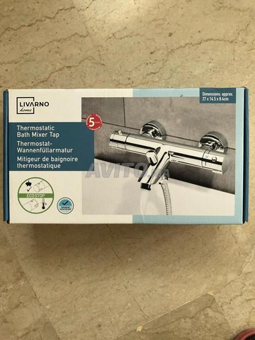 Mitigeur thermostatique de baignoire et douche