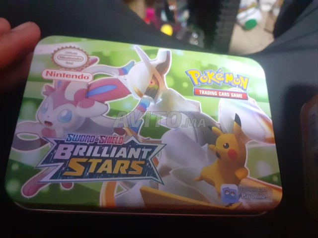 deux boites pokemon et cartes