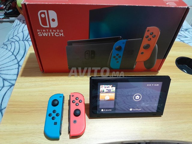 Switch OLED état neuf et boîte complète 