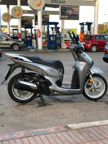 sh 300 fiha makina 7ara tar9im sabi9