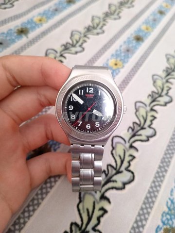 swatch irony stainless steel