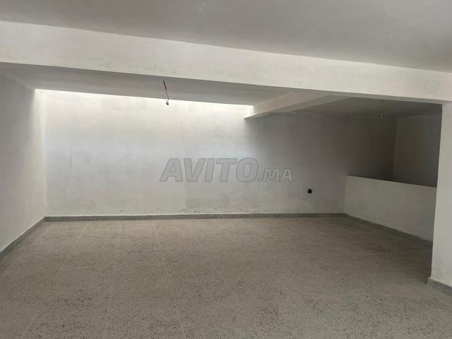 Magasin de 100m2 avec cave et mezzanine