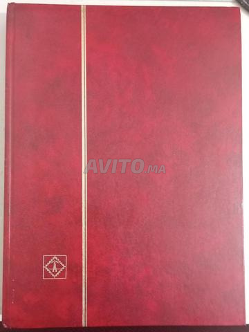 ألبوم طوابع بريدية أصلي 48 صفحة مع 750 طابع