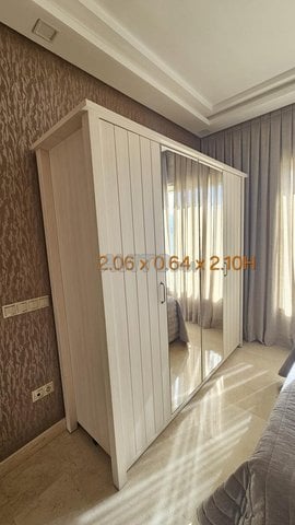 Armoire à portes miroir