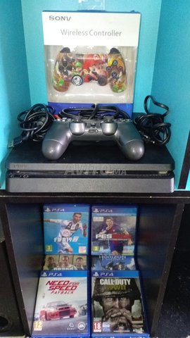 بلايستيشن 4 كامل مع ألعاب وخاص Fifa و PES فابور 