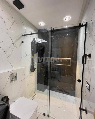 travaux verre trempé et Stadip 