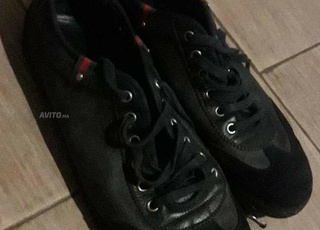 Baskets Gucci originales en bon état pour hommes 