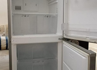 Refregirateur Candy bon état 