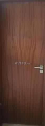 Portes en bois en bon état à vendre