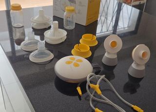 tire-lait medela swing maxi double pompage