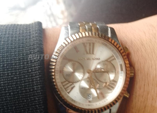 ساعة مشيل كورس النسائية 