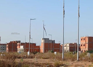 بقعة أرضية تجزئة الوحدة عمران 