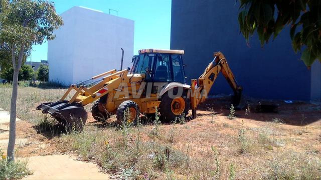 jcb tres bon etat 