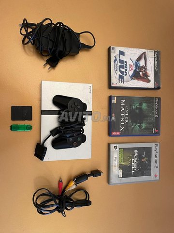 Playstation 2 avec carte mémoire, usb et cds