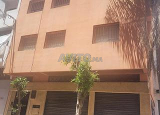 maison avec 2 façades et grand garage à  vendre