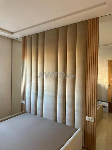 Tête de lit sur mesure avec habillage mural