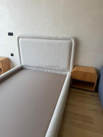 Lit tapissier design moderne sur mesure