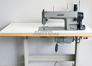 Machine à coudre - آلة خياطة