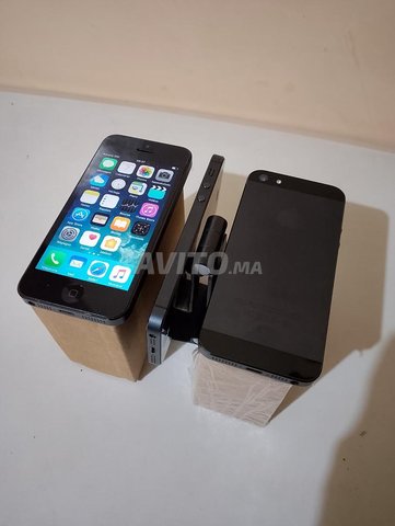 ايفون 5 رمادي بحالة جيدة جدا إلى ممتازة