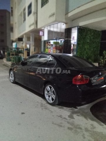 BMW E90 essence 11cv 