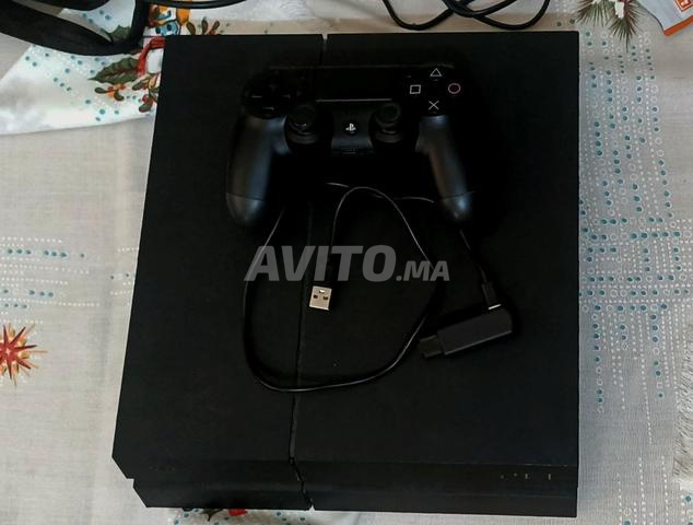  Ps4 fat V12.16 1000gb ba9i n9i w m3ah 1manit 