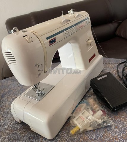 ماكينة خياطة كهربائية بحالة جيدة QUIGG NM800