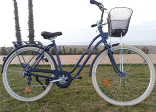 Vélo Elops 520 en Excellent état  et CADEAUX 