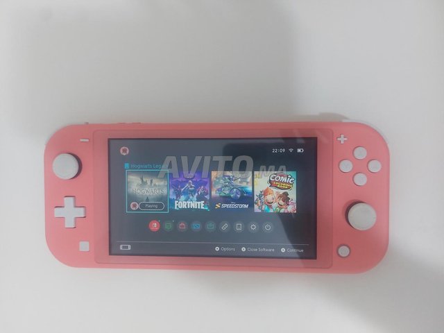Nintendo switch lite بحالة جيدة مع Hogwarts