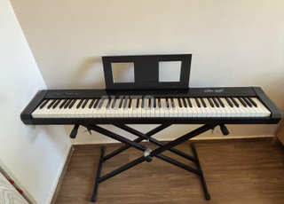 piano trés bon état