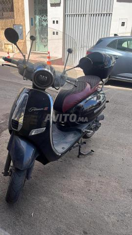 Moto mzyan li bghah marhba