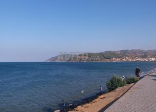 🏝️ أرض للبيع في أزلا – إطلالة على البحر والجبل 