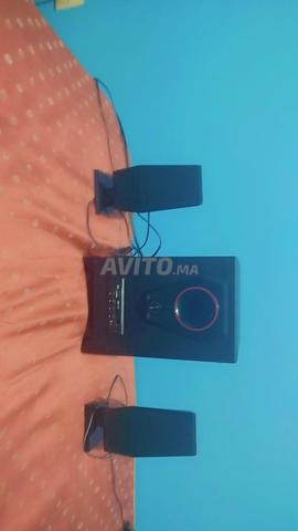 une grande baffe avec 2 petites baffes