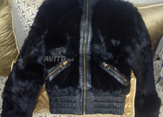 veste courte en fourrure et cuir