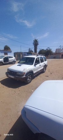 Kia Sportage en bon état, moteur et peinture remplacés.