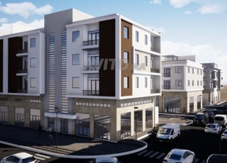 Terrain immeuble 3 étages commerce 2 faces plage Ifni