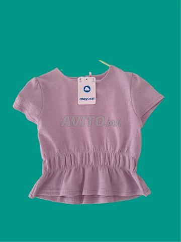 ملابس جديدة تم شراؤها من إسبانيا للبنات