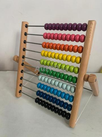 Calculatrice (abacus) en très bon état / excellente pour l'apprentissage