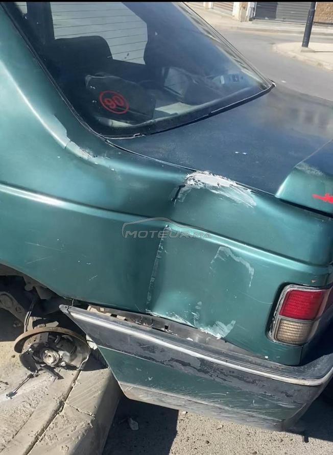 405 Peugeot accidente essence 