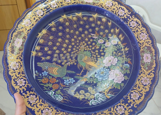 Plat en forme de paon libre