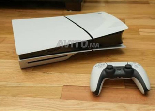 ps5 slim avec lecteur cd 2 manette plus jeux