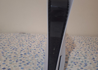 Ps5 avec 3 jeux et charging dock à vendre