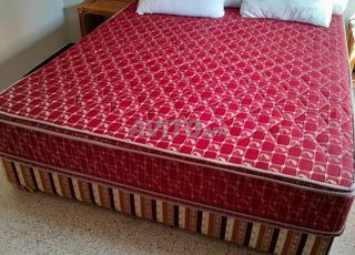 مرتبة وسرير