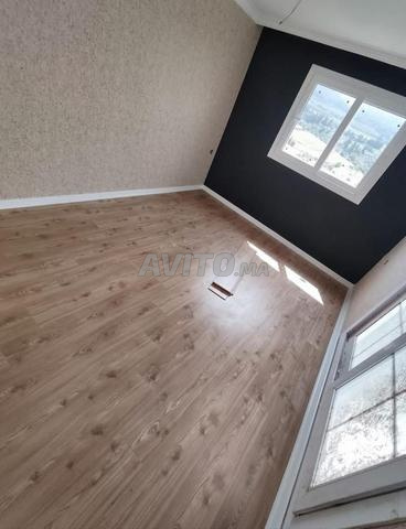 Service de pose de parquet en bois et de murs en bois